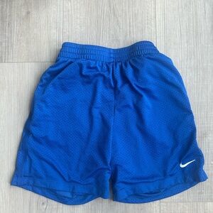 Nike boys medium blue athletic shorts with pockets